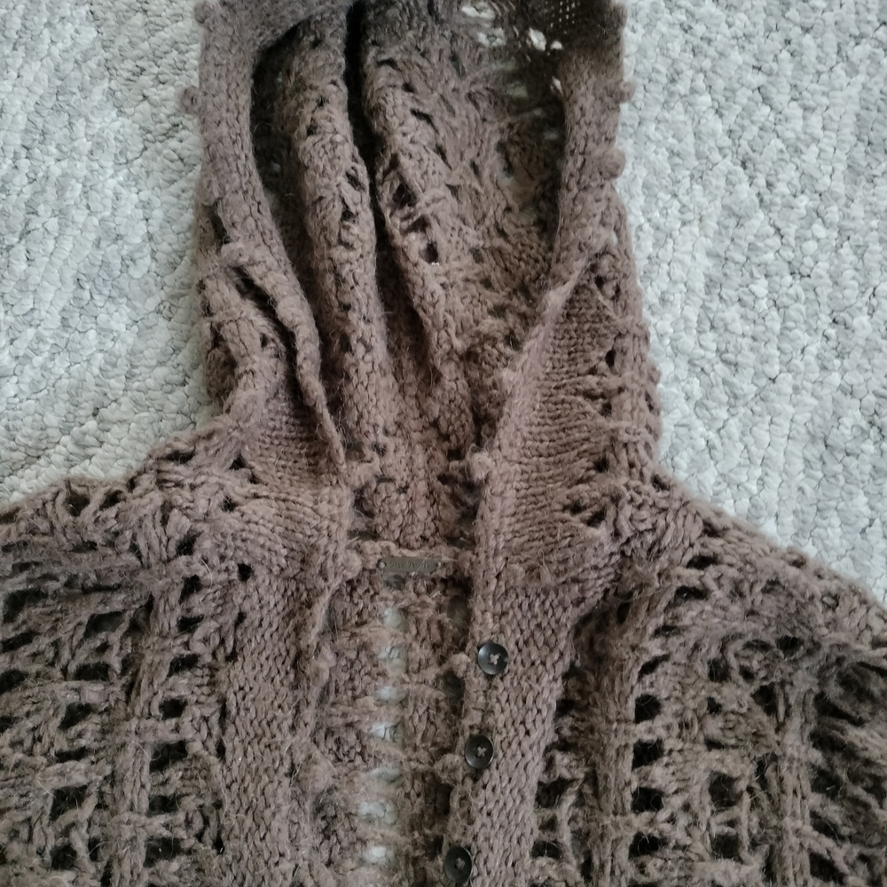 This is a Free People Pointelle Open Knit Alpaca Hooded Sweater in brown. Small - Picture 7 of 13